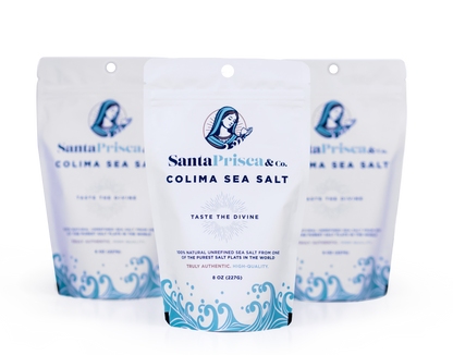 Three packages of Santa Prisca & Co. Colima Sea Salt with the center package in focus.